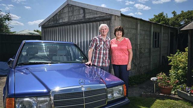 Classic Vehicle Group couple with Mercedes car